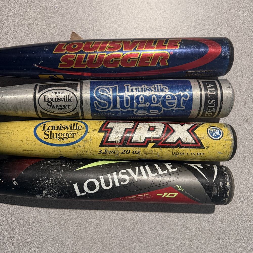 Lot Of 4 Louisville Slugger Used Baseball Bats.